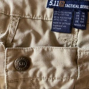 Tactical pants tons of pockets, quick dry fabric and foam knee pad inserts.